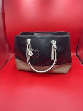 Guess 1981 Two-Tone Black and Tan Tote Bag with Flower Charm